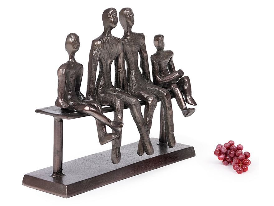 Sculpture. Family on Bench.